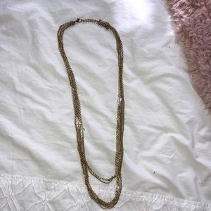 Long gold necklace